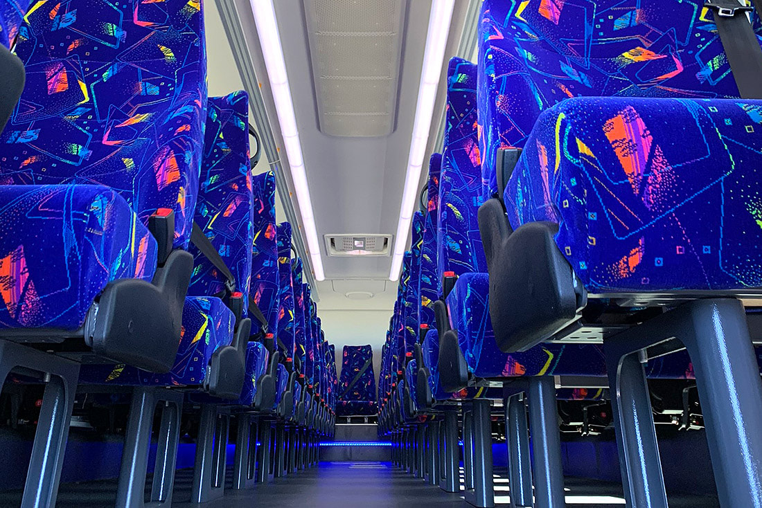 King Long coach with plush seats and blue LED atmosphere lights